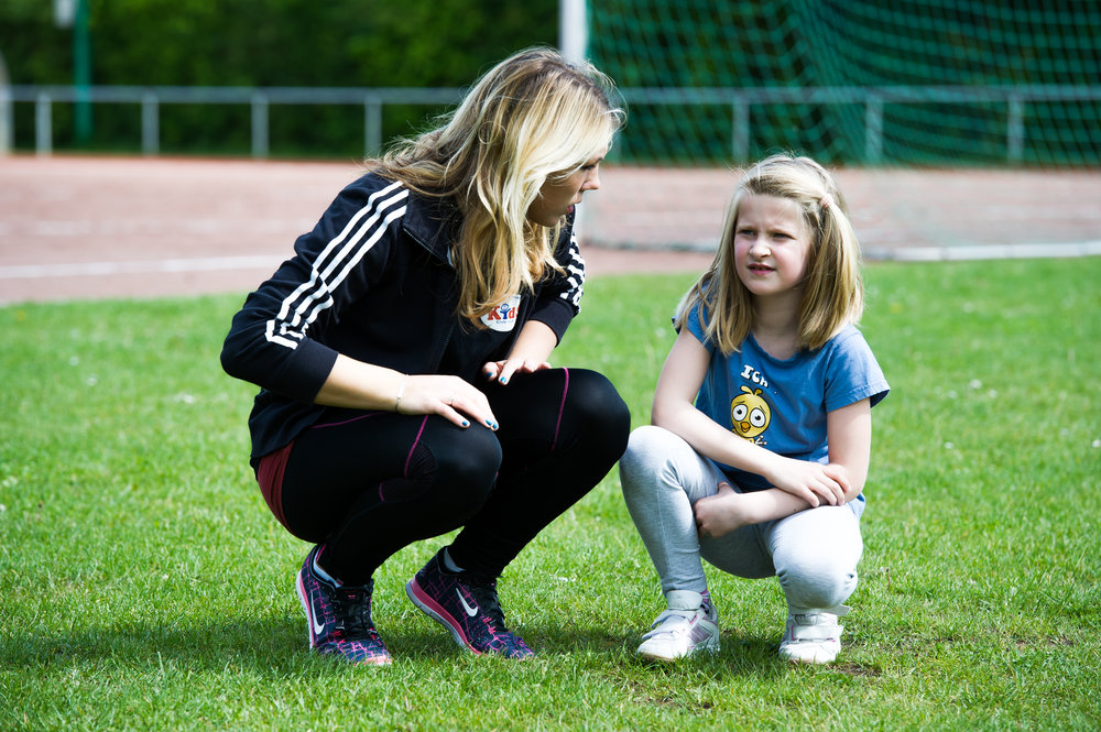 Trainer Kind Sport Rasen