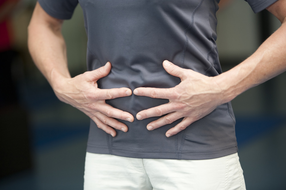 Haende Bauch Ruecken Massage Nahaufnahme